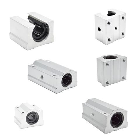 Linear bushings with housing units